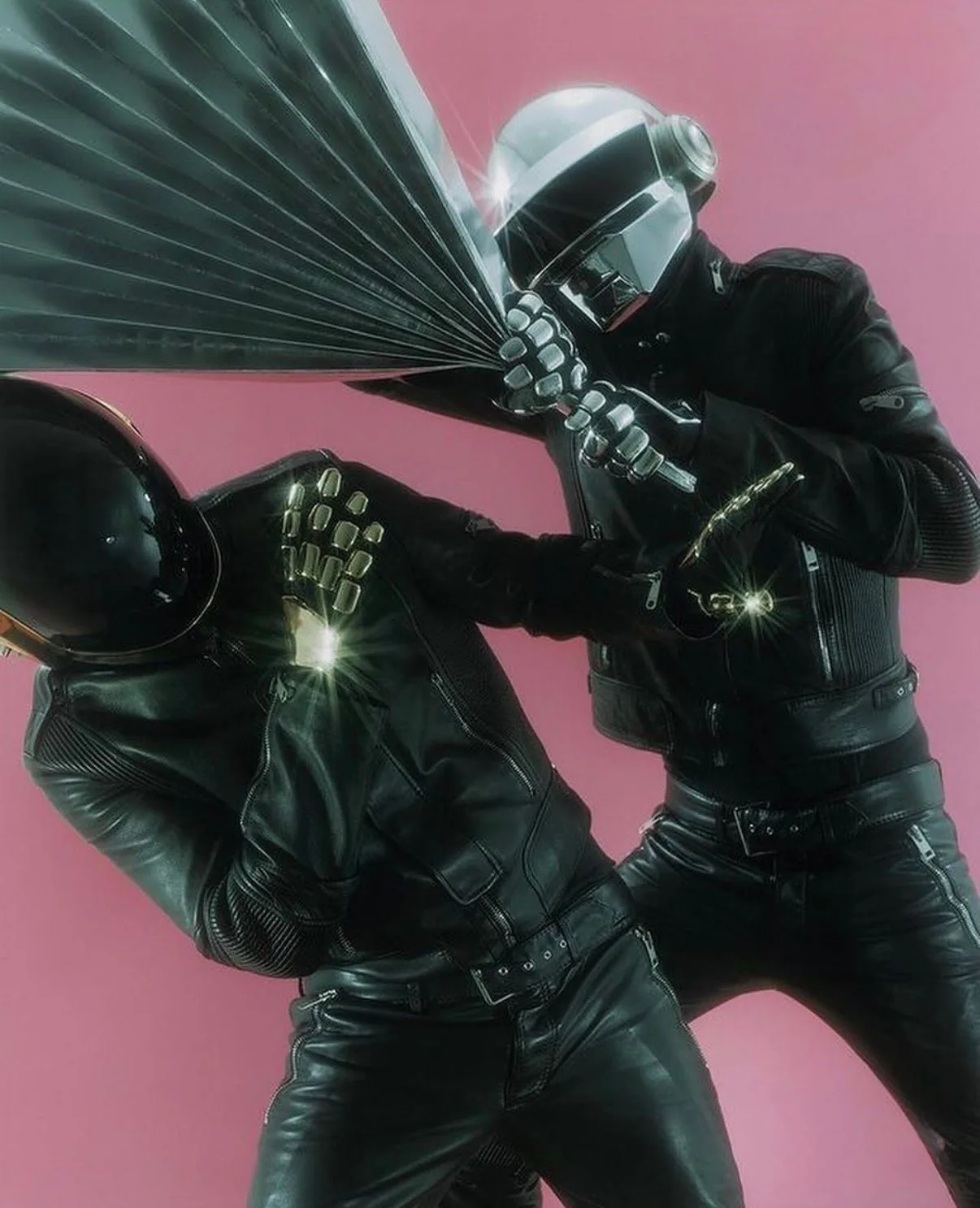 Daft Punk in Dior Homme leather on a pink backdrop