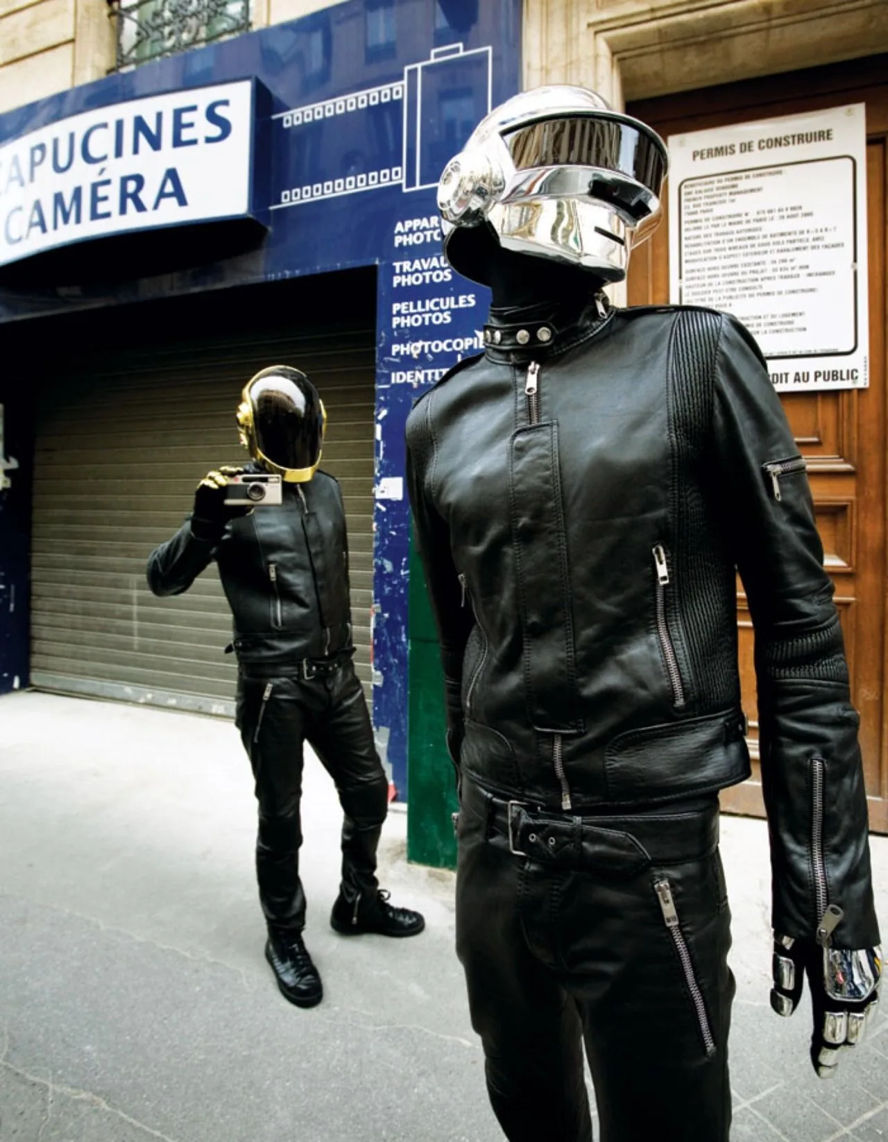 Daft Punk in Dior Homme leather suits outside Capucines Caméra, Paris